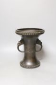 A Chinese or Japanese archaistic bronze two handle vase, 19th century24 cms high.