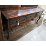 A reproduction 18th century style oak low dresser, length 170cm, depth 43cm, height 81cm