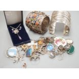 A 1950's box and a quantity of assorted costume jewellery, including continental bangles, etc.