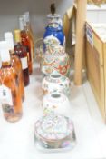 A group of Chinese famille rose jars, Paris porcelain lamps etc - tallest 34.5cm