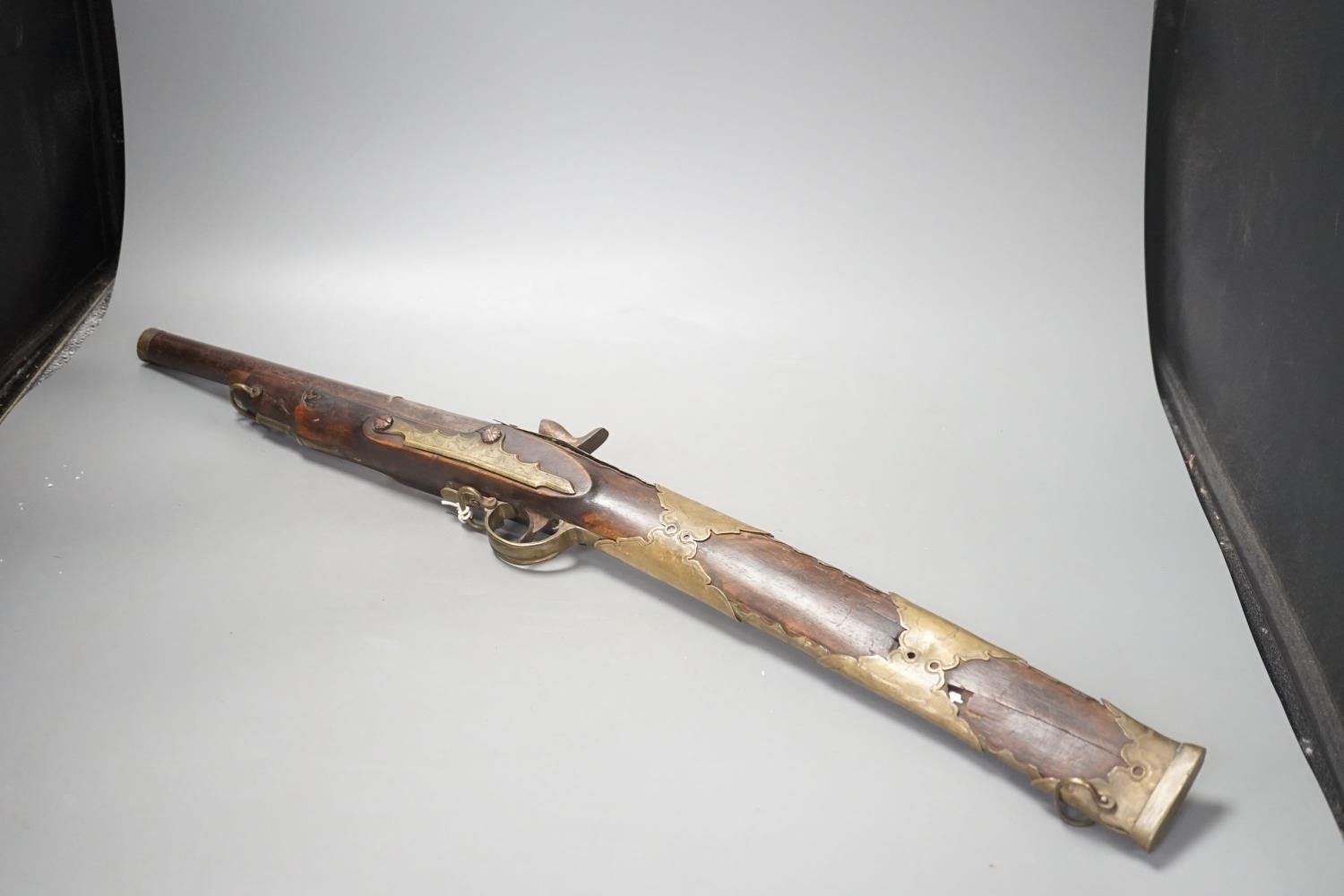 An Ottoman Empire brass-mounted percussion rifle with dual-action concealed barrel sword blade, - Image 4 of 6