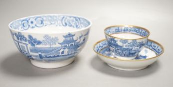 A New Hall slops bowl printed with the 'Duck' pattern and a teabowl and saucer printed with the '