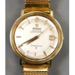 A gentleman's steel and gold plated Omega Constellation automatic wrist watch, on associated