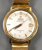A gentleman's steel and gold plated Omega Constellation automatic wrist watch, on associated