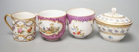 An 18th century Meissen pink ground coffee cup with entwined handle painted on two sides with a