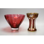 An American? enamelled glass vase and a ruby glass bowl,bowl 23.5 cms diameter.