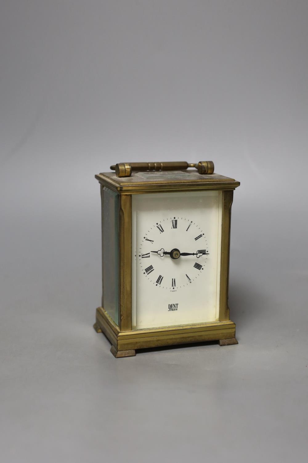 A Dent retailed brass carriage timepiece,12 cms high.