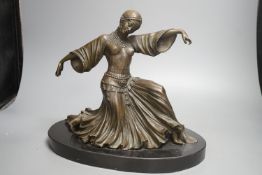 After Chiparus, a bronze figure of a ballet dancer,29 cms high.