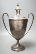 A George III demi fluted silver two handled urn shaped pedestal presentation trophy cup and cover,
