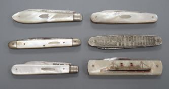 Three assorted mother of pearl mounted silver bladed fruit knives, one other penknife and two