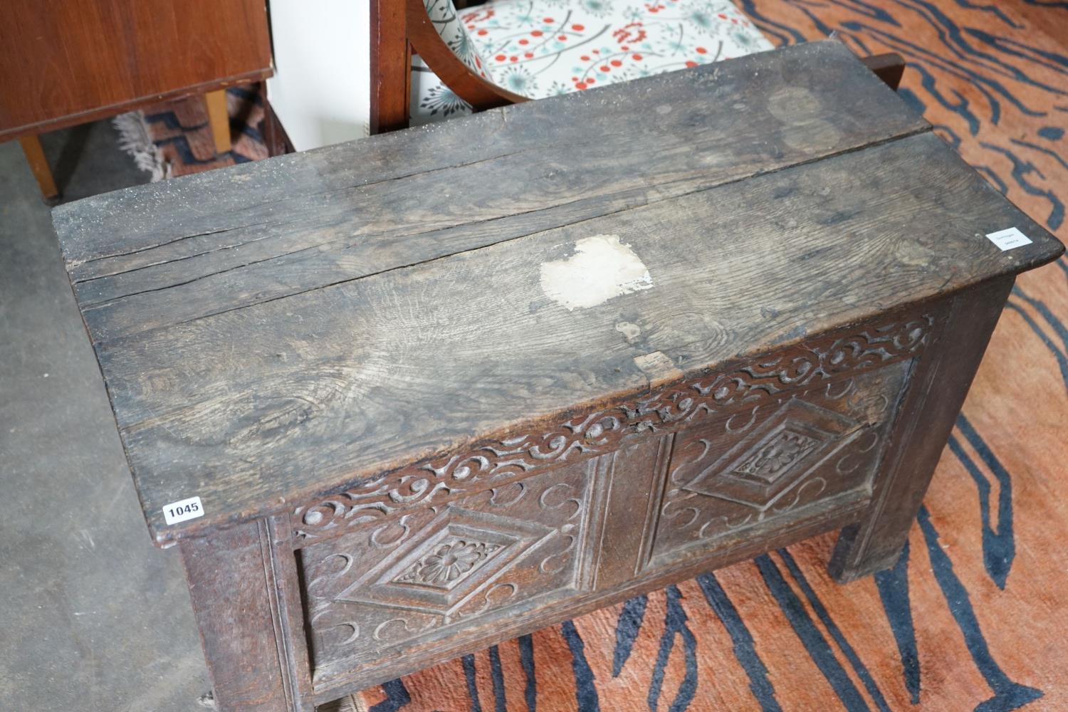 A small 18th century carved oak coffer, with a carved panelled front, length 102cm, depth 47cm, - Image 2 of 3