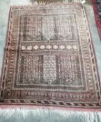 A North West Persian red ground rug, 130 x 104cm