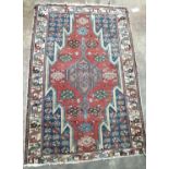 A Hamadan red ground rug, 125 x 84cm