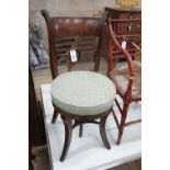 A Regency mahogany music chair with a revolving seat