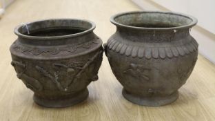 Two Japanese bronze planters,top being 25 cms diameter.