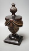 E. H. Pinto collection - a 19th century painted treen neo classical urn,28cms high.