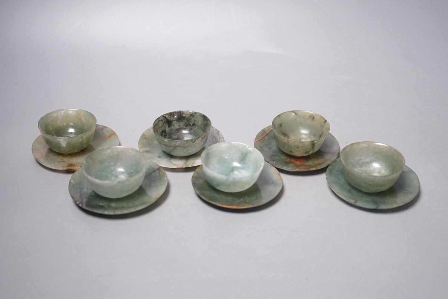 A set of six Chinese moss agate tea bowls and six saucers, engraved Qianlong mark, 19th century,