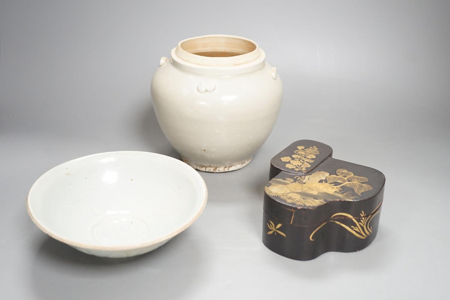 A Chinese Qingbai type bowl, a Ding type jar and a Japanese lacquer box, tallest 15cm