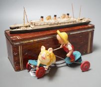 Bassett-Lowke Waterline Model Ships and a Japanned boxed celluloid ‘pig chaser’ toy, 9cms high.
