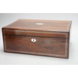 A Victorian rosewood sewing box containing white metal lidded glass bottles,box 37 cms wide x 15 cms