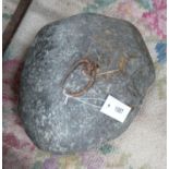 A vintage iron mounted tethering stone, width 36cm