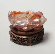 A late 19th / early 20th century Chinese agate brushwasher, wood stand - 8cm tall