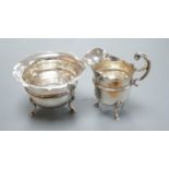 A George V silver cream jug and sugar bowl, C.S. Green & Co, Birmingham, 1910, 131 grams.