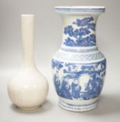 A Chinese blue and white vase and a crackle glaze bottle vase, tallest 34.5 cms high.