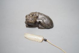 A Chinese jade figure of a lion-dog and a jade carving of a cicada, possibly Ming dynasty or