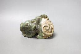 A Chinese spinach green and cream jade group of a dog and puppy,15 cms