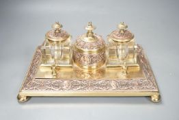 A 19th century copper and brass two bottle inkstand. Length 24cm