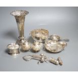 A late Victorian repousse silver vase, Sheffield, 1900, 17.9cm, loaded, a silver tea strainer and