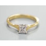 A modern 18ct gold and solitaire princess cut diamond set ring, size M, gross weight 3 grams,