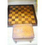 An early 20th century turned wood Staunton pattern chess set and inlaid board