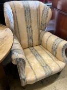 A late Victorian oak armchair