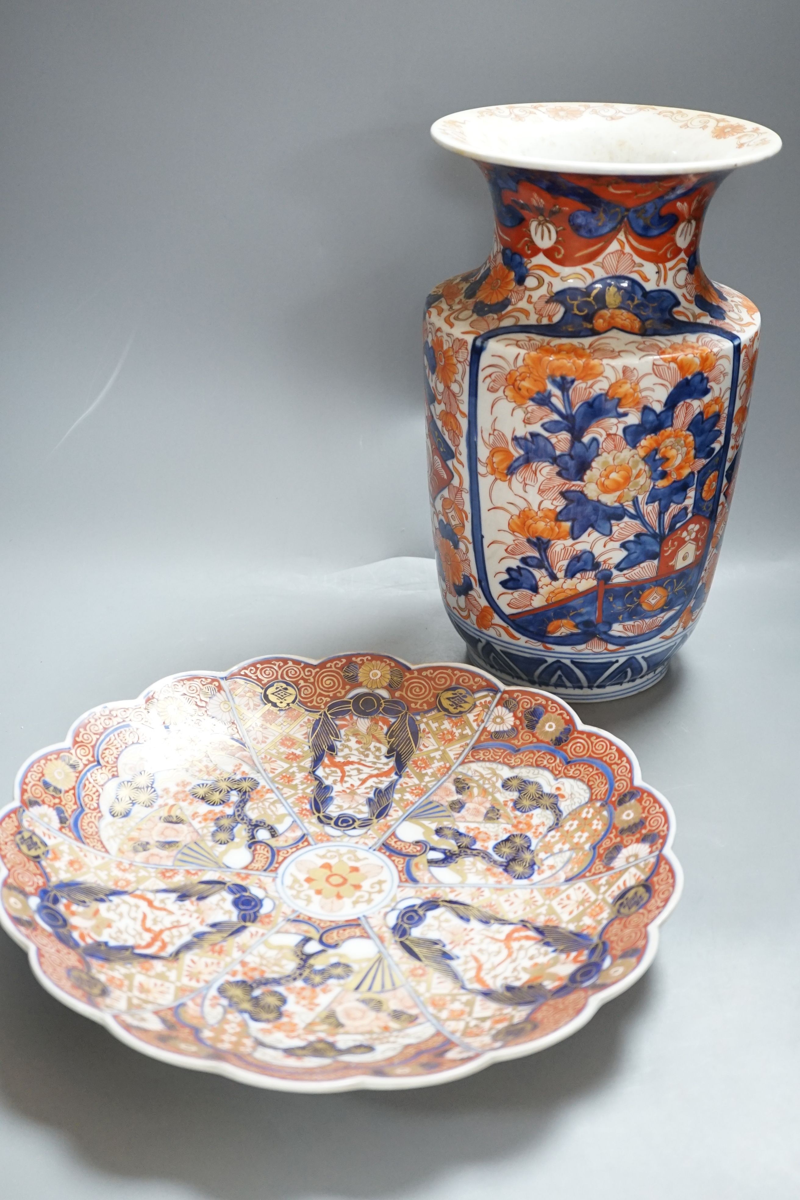 A Japanese Imari vase, 31cm tall, and an Imari dish