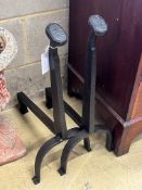 A pair of 19th century French painted wrought iron fire dogs, height 59cm