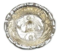An American sterling embossed fruit bowl by Wallace, diameter 25.4cm and a Gorham sterling napkin