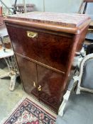 A French Art Deco style amboyna veneered marble topped drinks cabinet, width 61cm depth 40cm