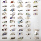 A collection of thirty nine assorted modern 9ct gold and gem set rings including amethyst,