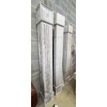 Four painted wood fluted square columns, tallest 222cm