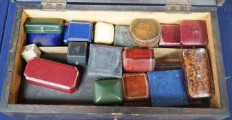 A a wooden box containing a collection of leather jewellery boxes.