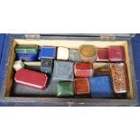 A a wooden box containing a collection of leather jewellery boxes.