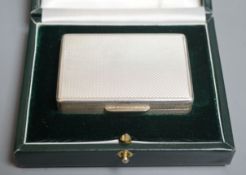 A modern cased engine turned silver rectangular pill box, by Peter John Doherty, London, 2007, 64mm,