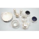 Five assorted silver condiments, napkin ring and silver shell dish with glass liner, etc