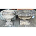 Two reconstituted stone circular campana garden urns, larger diameter 58cm height 38cm