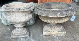 Two reconstituted stone circular campana garden urns, larger diameter 58cm height 38cm