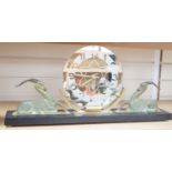 An Art Deco bronze and black slate ‘antelope’ mantel timepiece, 62cm