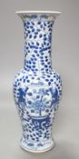 A Chinese blue and white floral vase - 31.5cm tall