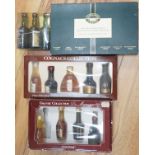 Four boxed miniature sets, single malt, cognac and madeira